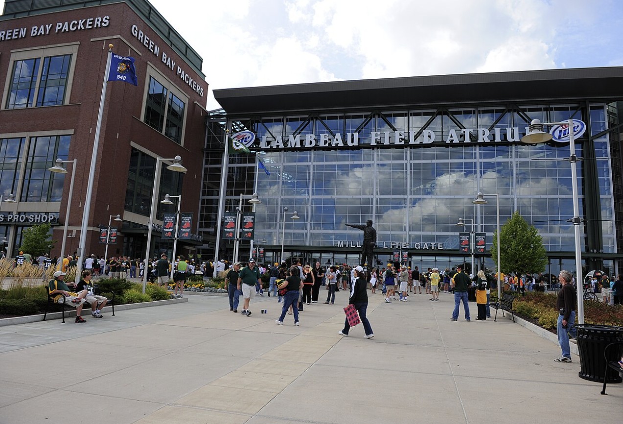 Front of the Lambeau Field atrium with the Miller Lite Gate sign and the Vince Lombardi statue, September 2009