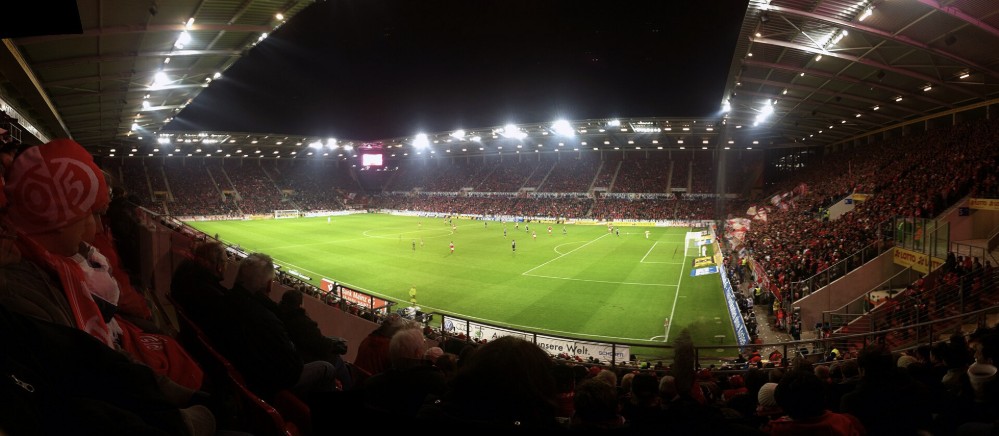 View of the pitch from the stands during a night home game at Mewa Arena
