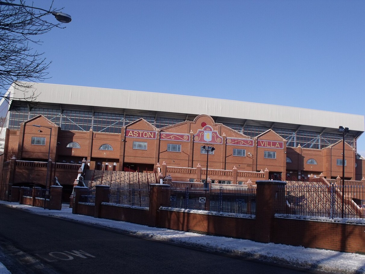 The brick facade of the Holte End stand