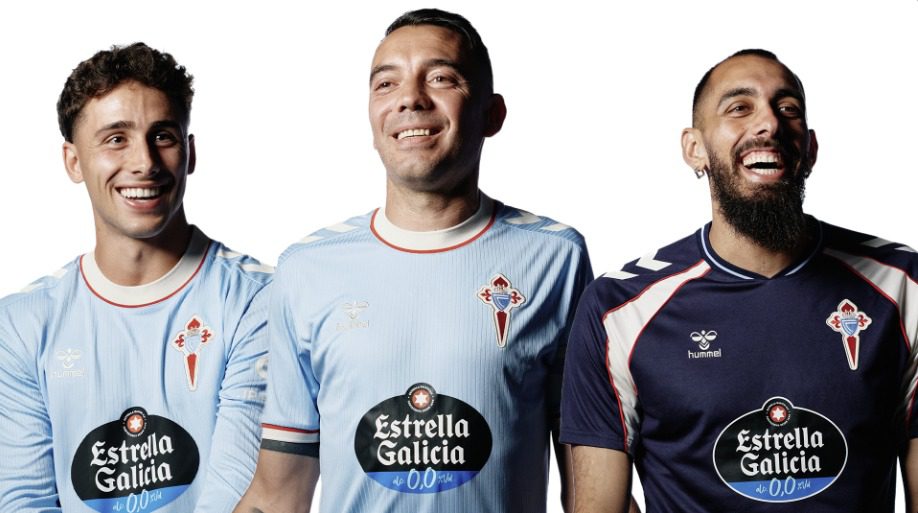 Three Celta players in the 2026-27 sky blue home and navy away shirts carrying the Estrella Galicia 0,0 logo