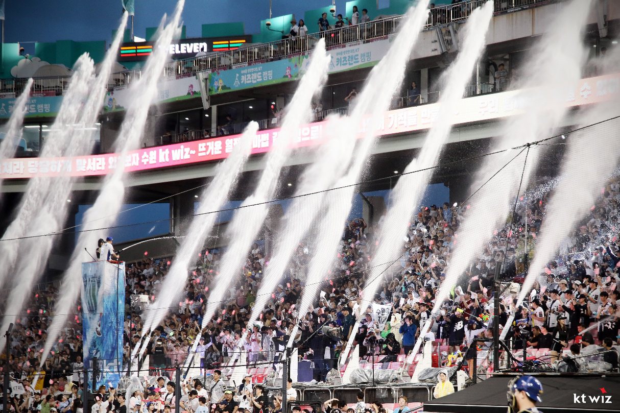 Water cannons spraying toward the stands during the 2026 Water Festival